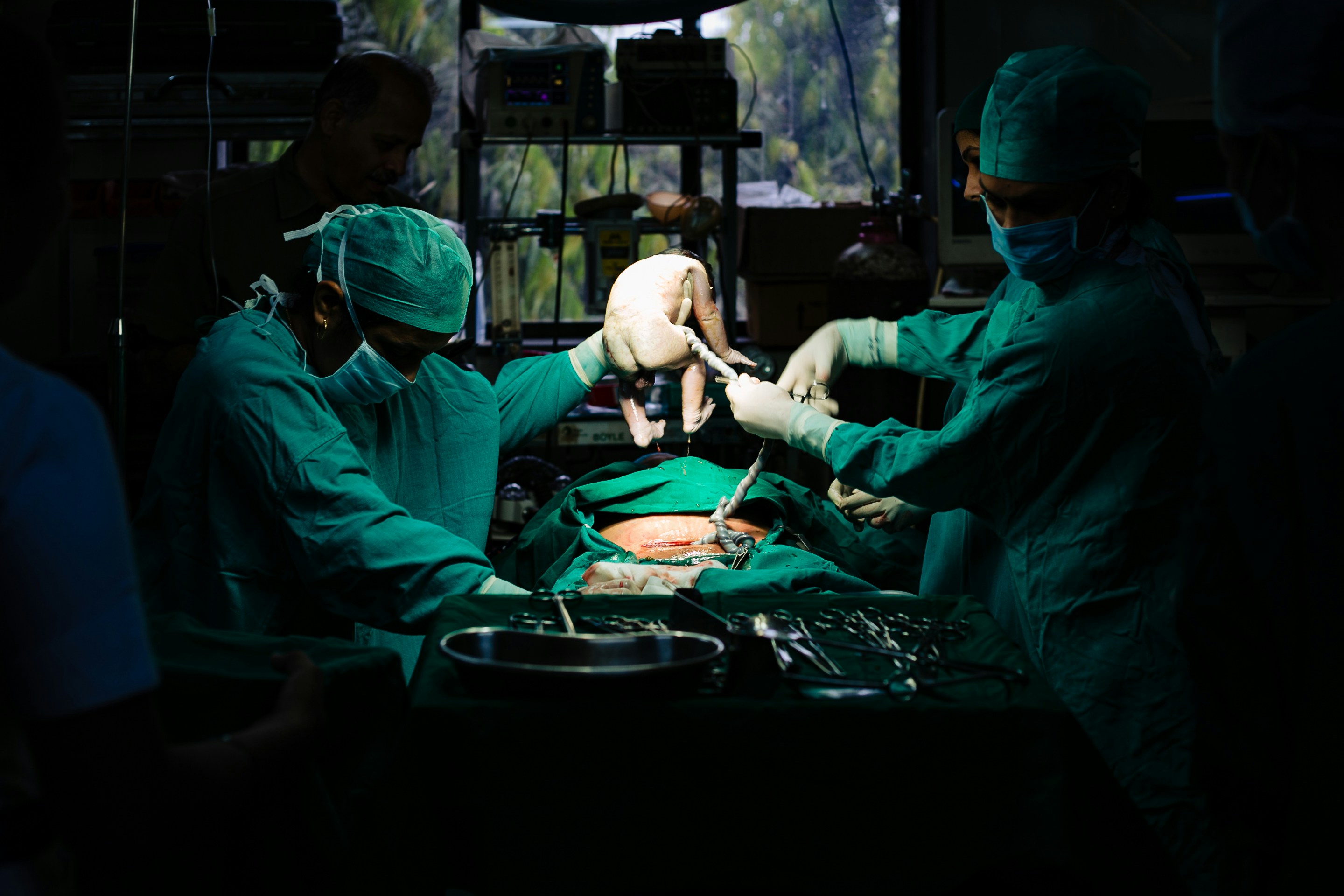 Robotic surgery team in operating room